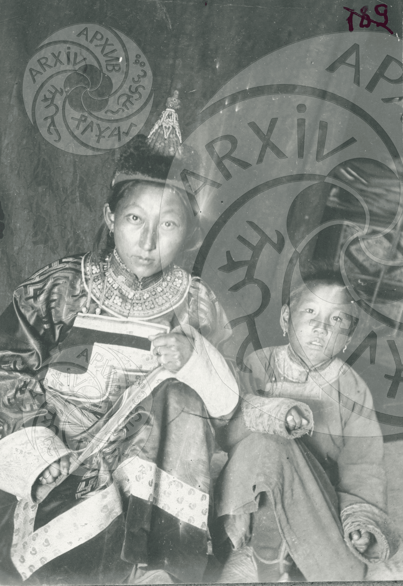 Photo 8. National costume of a wealthy Tuvan girl. Khemchiksky Khoshun. 1916.